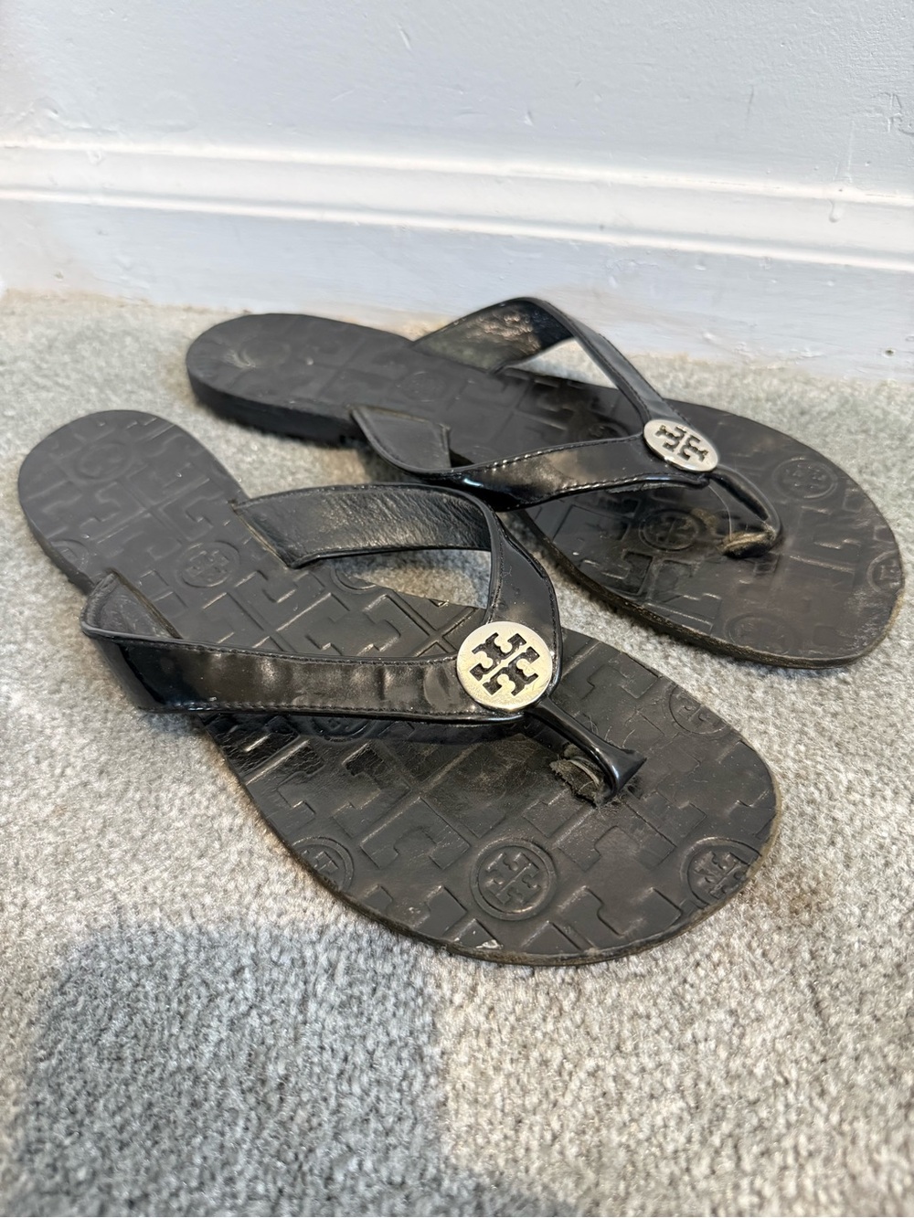 Tory Burch Black Logo Thong Sandals with Silver Emblem